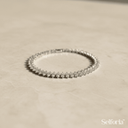 Silver tennis bracelet with sparkling stones in a classic elegant design