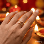Woman wearing elegant gold ring during festive celebration