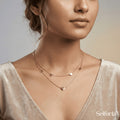 Gold plated layered heart necklace with delicate double chain design