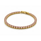 A Selforia India gold tone plated tennis bracelet featuring a double row of small, round-cut pink gemstones, displayed on a clean white background.