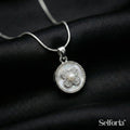 Silver floral stone pendant necklace with round minimalist design by Selforia