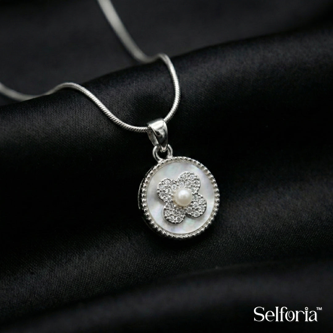 Silver floral stone pendant necklace with round minimalist design by Selforia