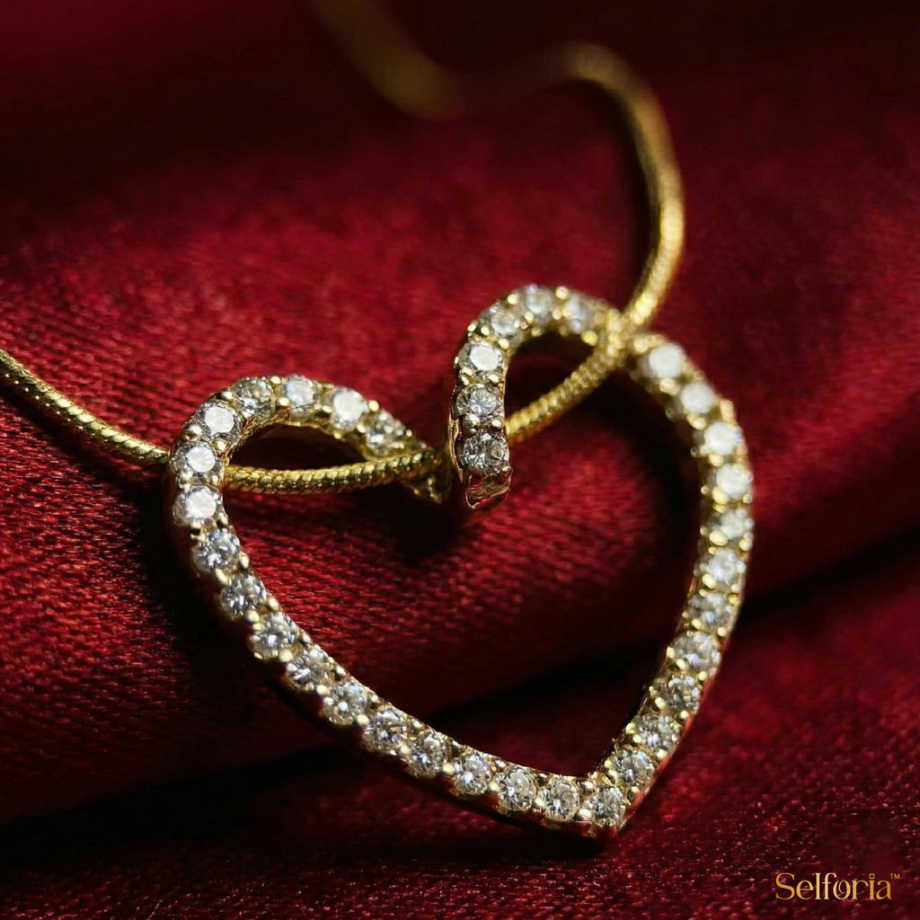 Detailed view of gold-plated heart pendant with crystals