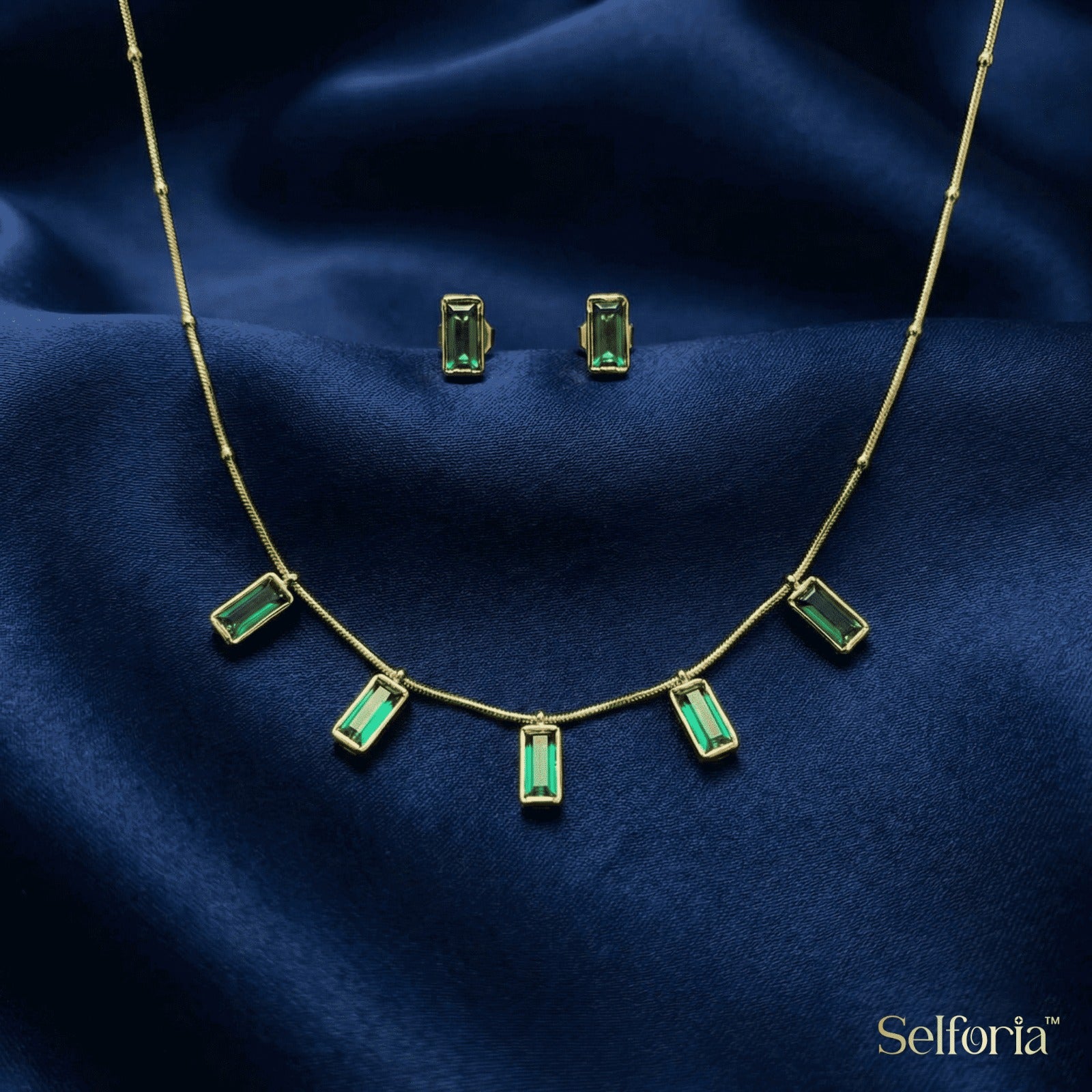 Gold finish emerald green necklace suitable for ethnic and modern outfits
